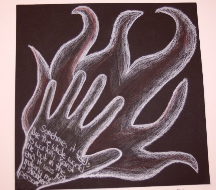 Snapped this photo of a piece at the school district art show.  Not sure if I agree with the sentiment, but the flames are fitting at least!